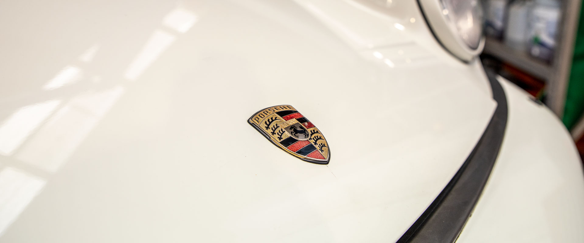 White Porsche Hood with Logo